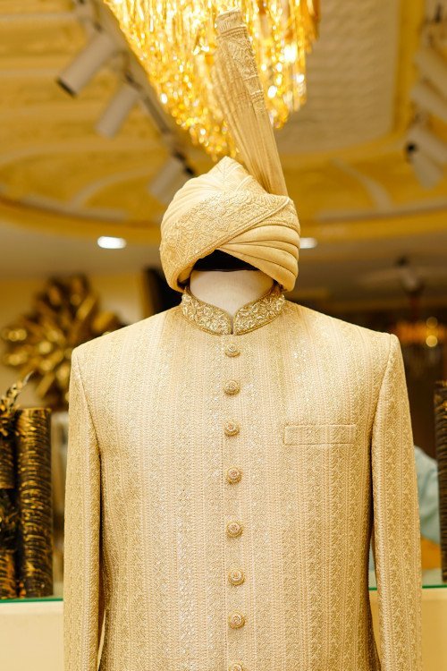 Short Sherwani in Skin Tone with Intricate Embroidery & Handwork Paired with Matching Kulla