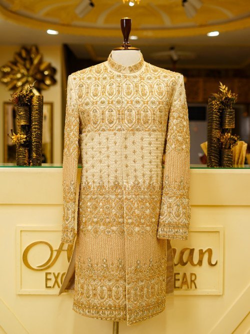 Exquisite Cream White Sherwani Featuring Full Detailed Hand Embroidery with Perfectly Coordinated Matching Kulla for a Regal and Timeless Look