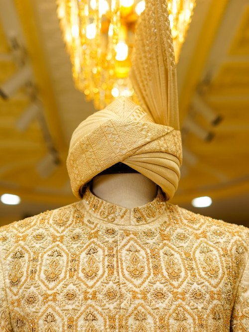 Exquisite Cream White Sherwani Featuring Full Detailed Hand Embroidery with Perfectly Coordinated Matching Kulla for a Regal and Timeless Look