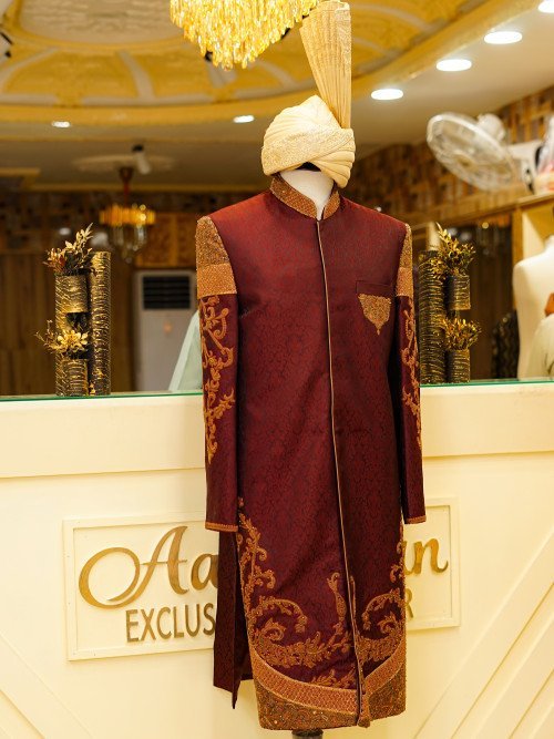 Sherwani in Deep Maroon with Exquisite Hand Embroidery and Elegant Print, Paired with Matching Kulla for a Majestic Look