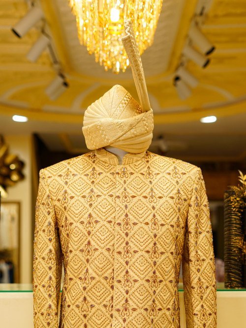 Short Sherwani in Skin with Full Detailed Hand Embroidery and Matching Kulla for a Sophisticated, Regal Look