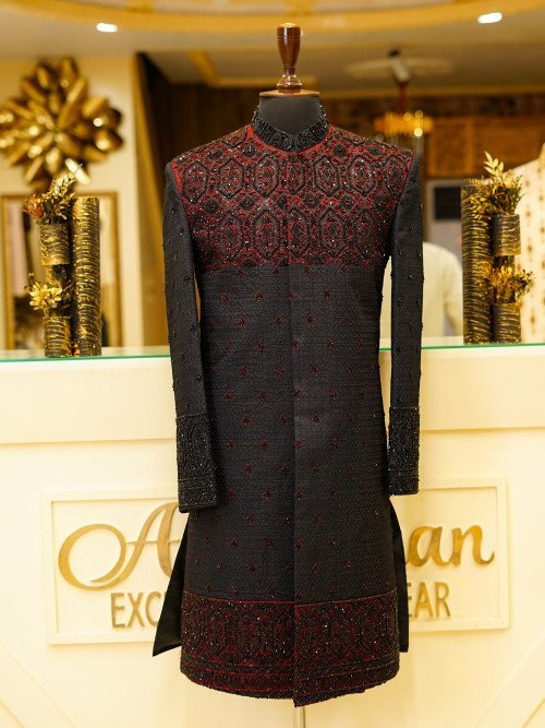 Short Sherwani in Bold Black Tone with Striking Red Hand Embroidery and Matching Kulla for a Regal Statement