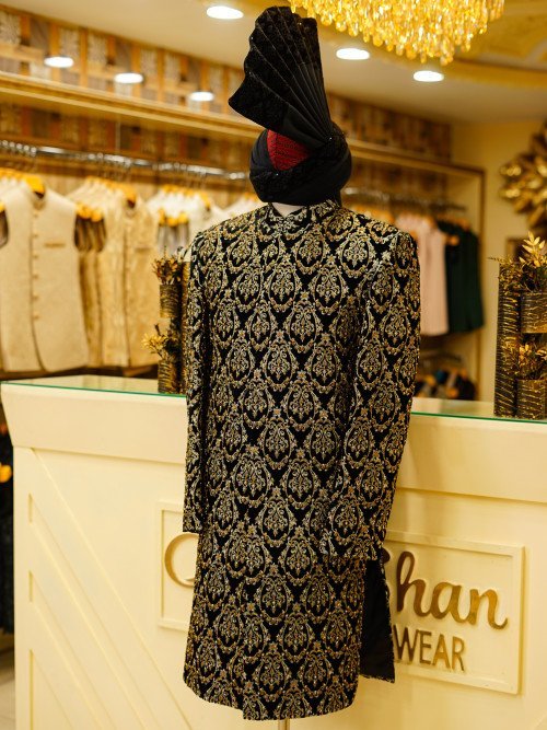 Short Sherwani in Rich Black Tone with Ornate Golden Hand Embroidery and Matching Kulla for a Regal Appeal