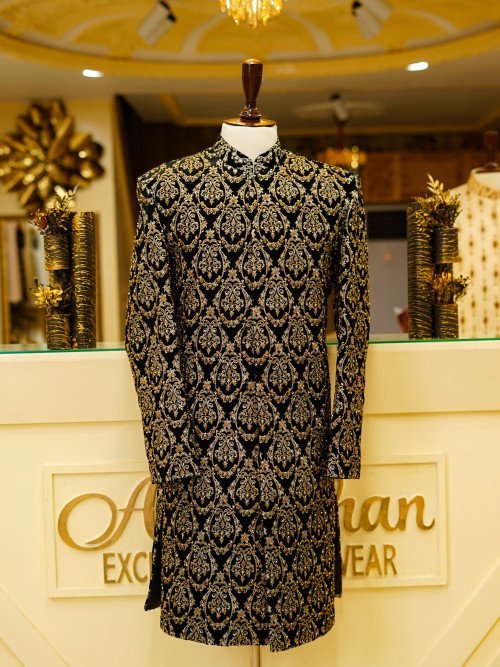 Short Sherwani in Rich Black Tone with Ornate Golden Hand Embroidery and Matching Kulla for a Regal Appeal