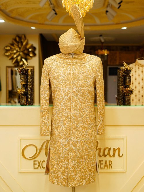 Short Sherwani in Subtle Skin Tone with Delicate Embroidery and Matching Kulla for a Graceful Heritage Look