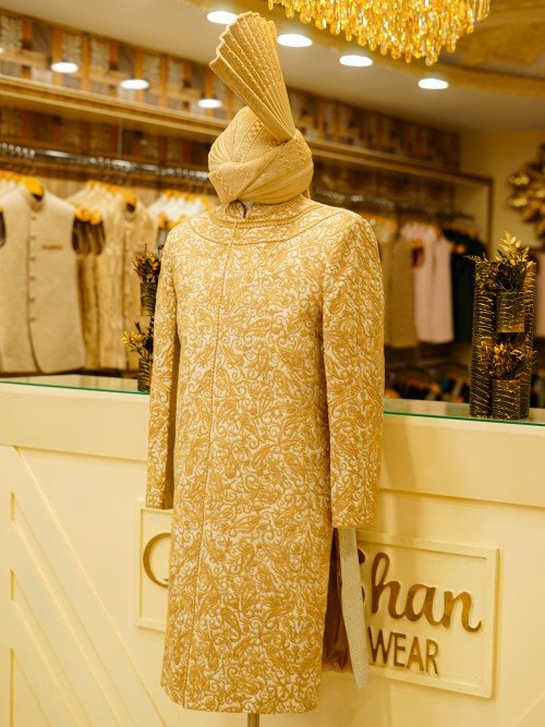 Short Sherwani in Subtle Skin Tone with Delicate Embroidery and Matching Kulla for a Graceful Heritage Look