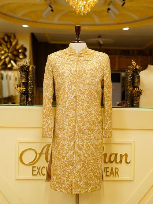 Short Sherwani in Subtle Skin Tone with Delicate Embroidery and Matching Kulla for a Graceful Heritage Look