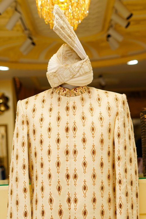 Short Sherwani in Skin Tone with White Embroidery and Matching Kulla for a Sophisticated Contemporary Look
